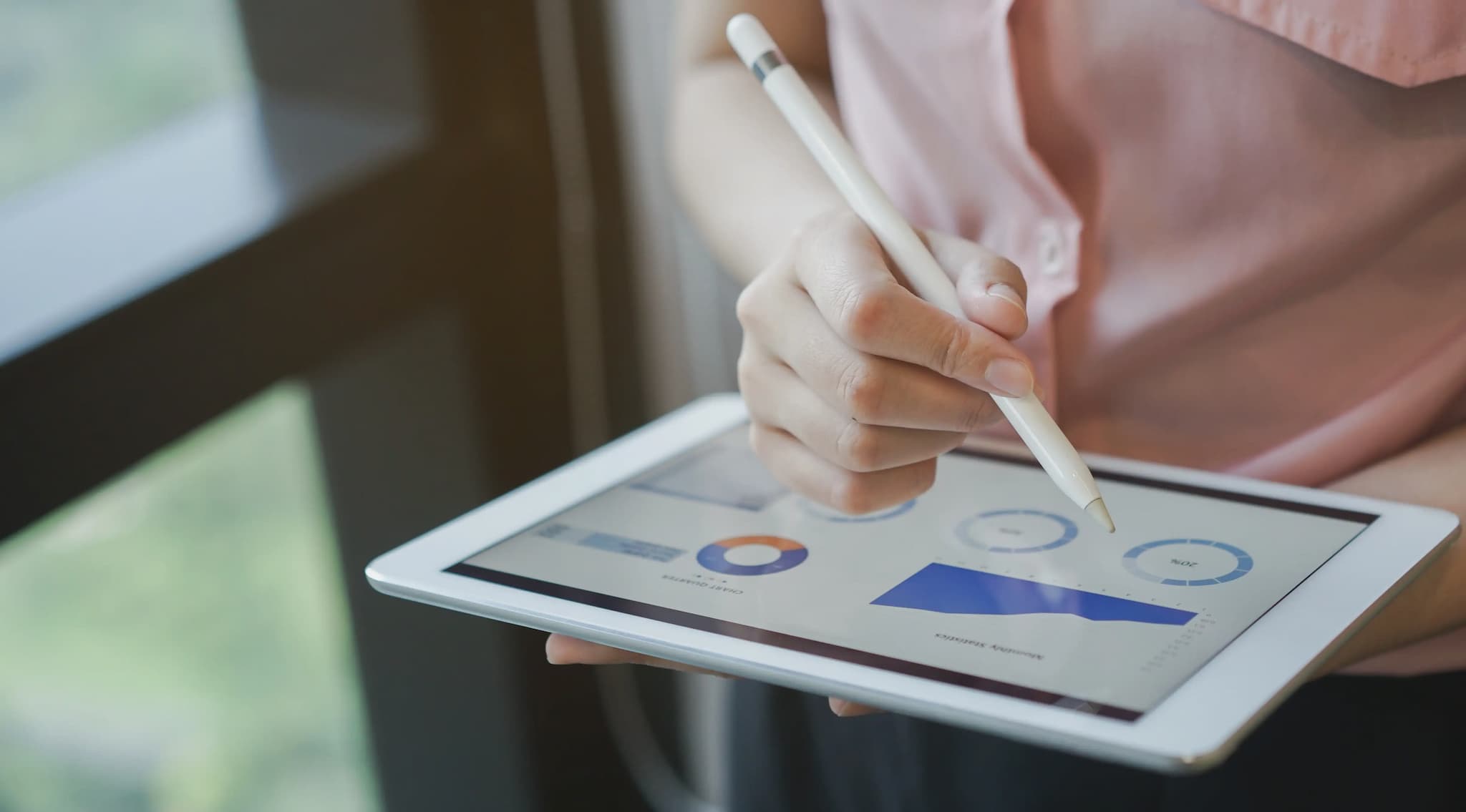 person working on an iPad